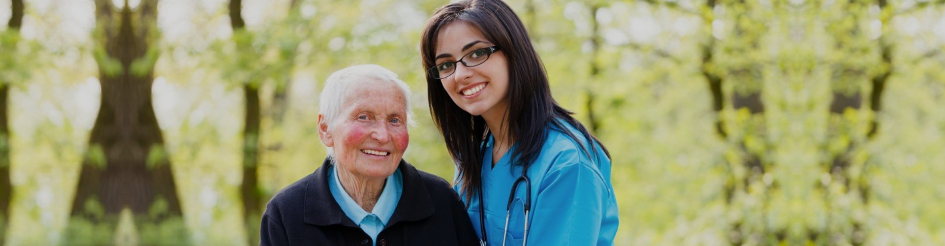 nurse and senior patient smiling